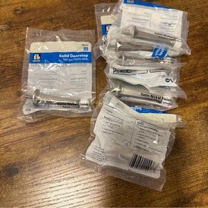 Everbilt solid doorstop. Satin nickel finish. 489247. NEW- set of seven.